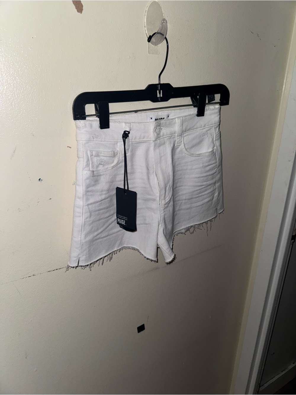 Paige white cut off Jean shorts size 24